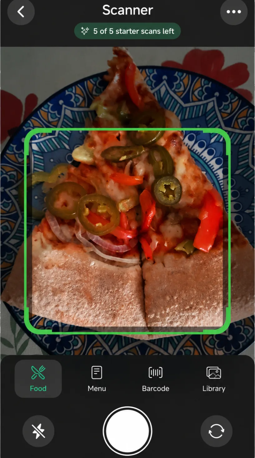 GlucIQ meal scanner focused on a plated meal